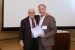 Dr. Nagib Callaos, General Chair, giving Prof. Detlev Doherr the best paper award certificate of the session "Complexity, Cybernetics and Control Systems." The title of the awarded paper is "Humboldt’s Vision of a Smart(er) World."